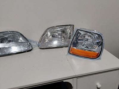97-03 Expedition 97-03 Ford F150 Chrome Headlights Headlamps Set  FLAWED READ