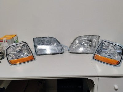 97-03 Expedition 97-03 Ford F150 Chrome Headlights Headlamps Set  FLAWED READ
